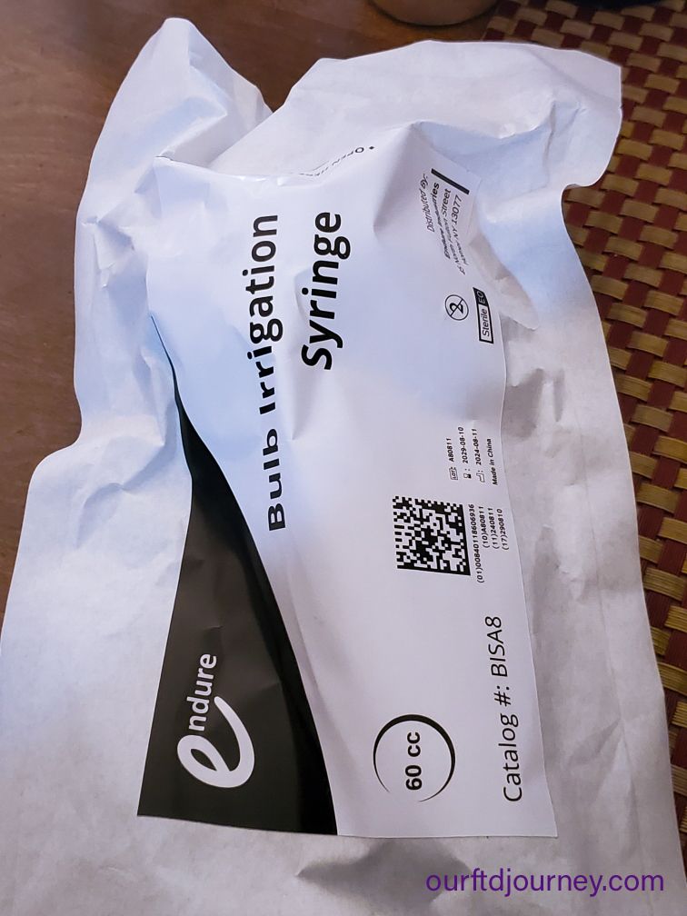 60ml feeding syringe for caregivers, used for food, drink, and hospice comfort care.